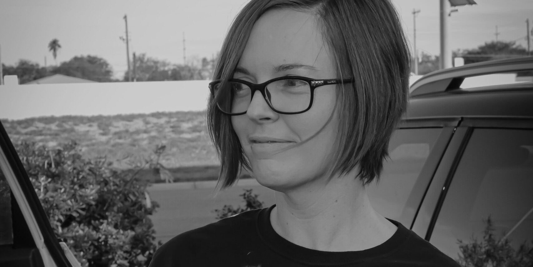 Black and White image of Rise for Animals Director of Grassroots Organizing, Amy Meyer