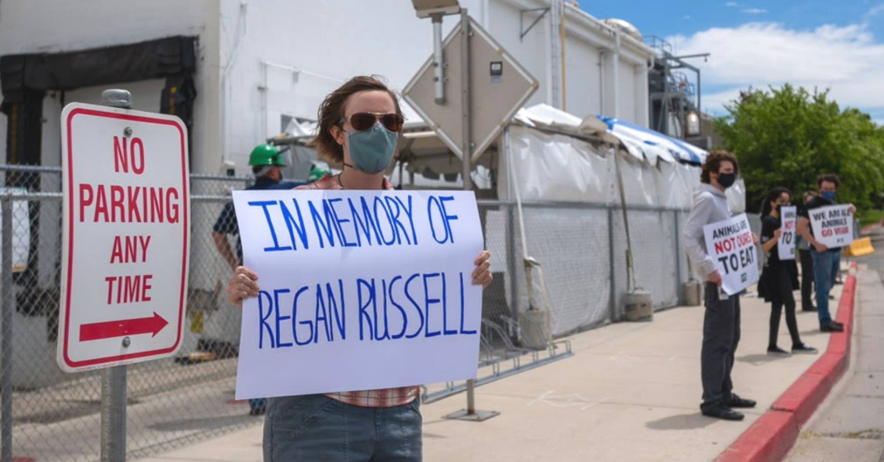 Amy Meyer, holding a sign 